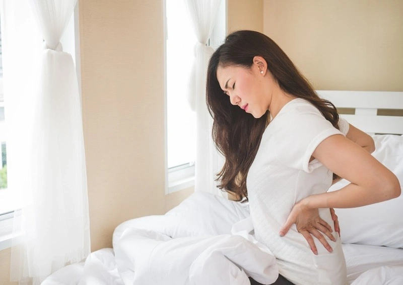 Đau lưng khi mang thai tuần đầu